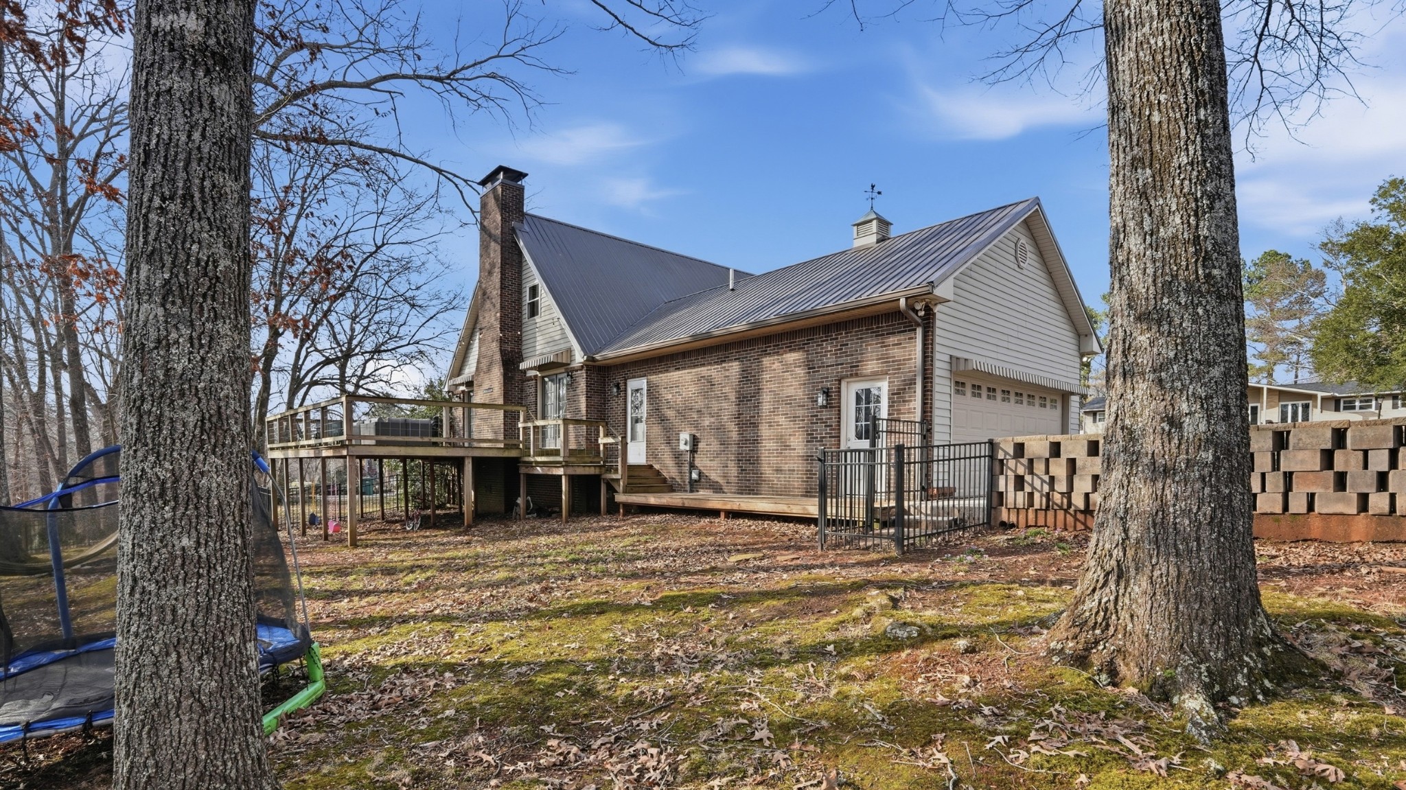 270 Wood Bluff Road Winchester, TN 37398 - Photo 43 of 55 a view of a house with large windows and a tree