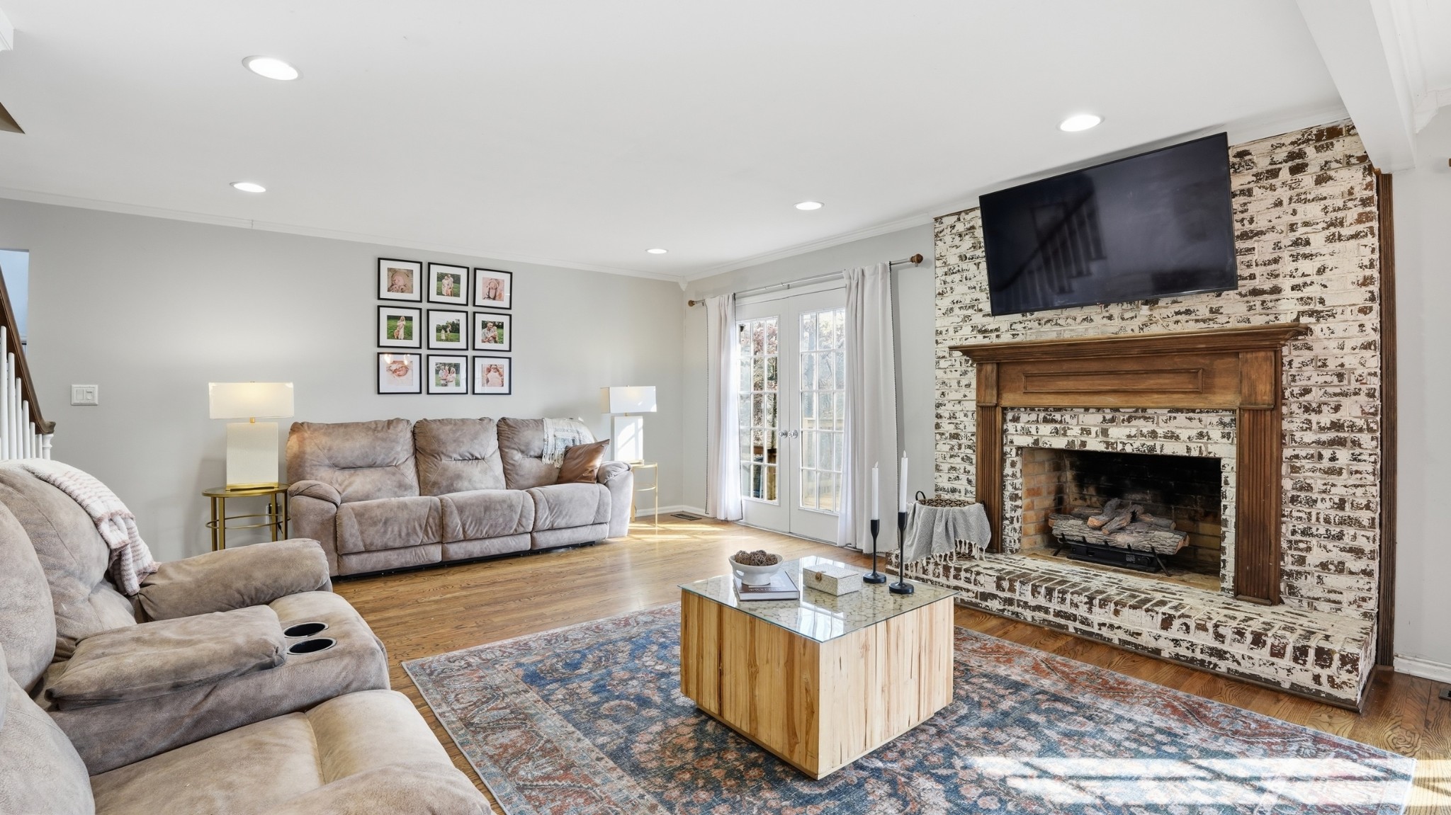 270 Wood Bluff Road Winchester, TN 37398 - Photo 10 of 55 a living room with furniture a fireplace and a flat screen tv