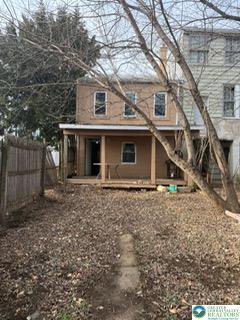 731 North Front Street Allentown, PA 18102 - Photo 22 of 22 a house with trees in front of it