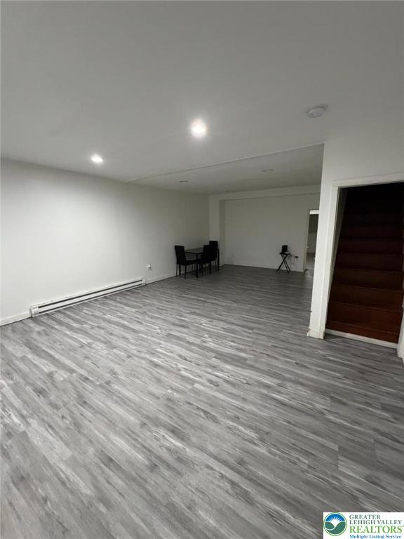 731 North Front Street Allentown, PA 18102 - Photo 3 of 22 wooden floor in an empty room with a fireplace