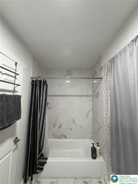 731 North Front Street Allentown, PA 18102 - Photo 10 of 22 a bathroom with a shower and a tub