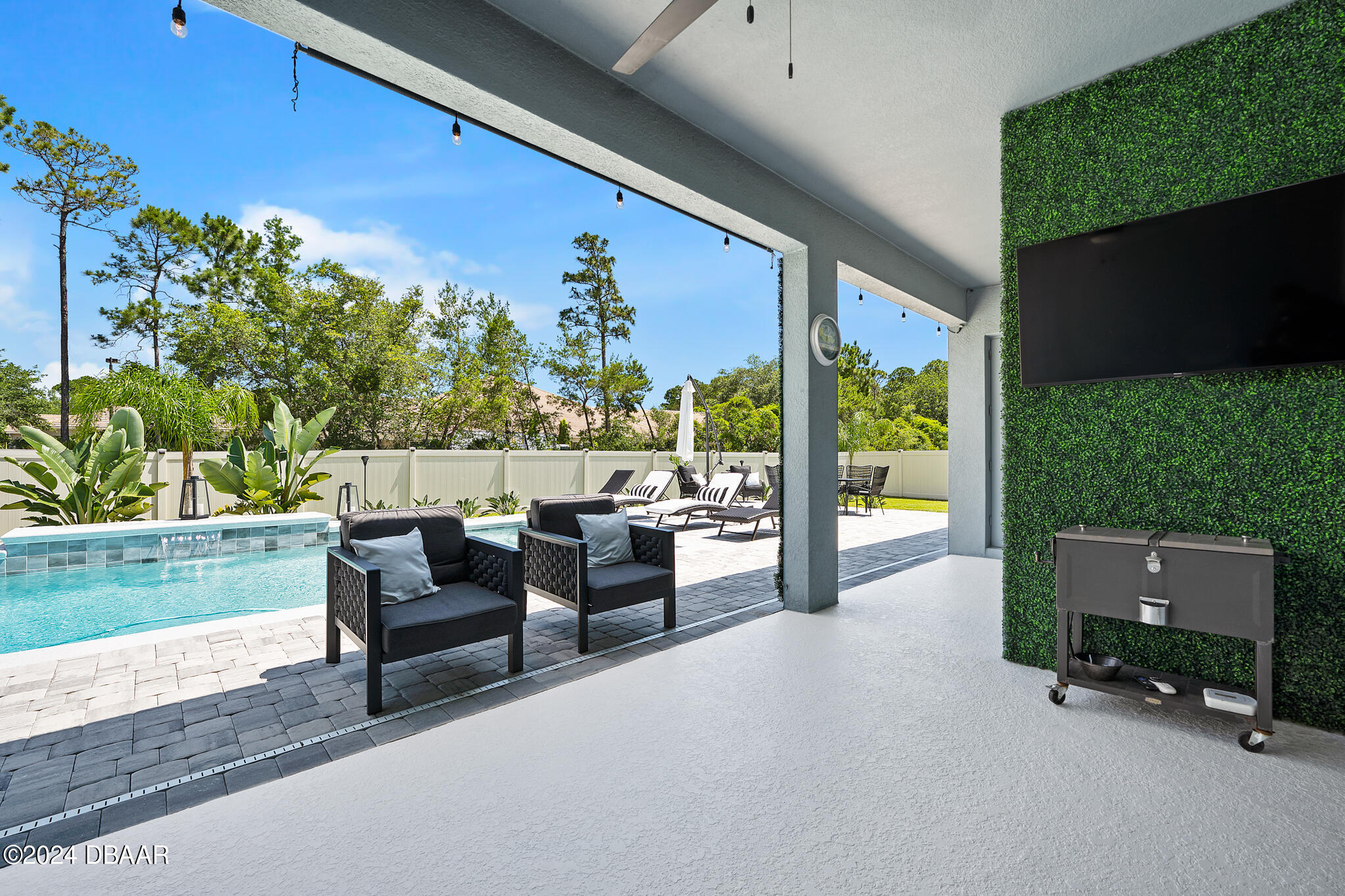 295 Cypress Trail Drive Ormond Beach, FL 32174 - Photo 26 of 67 a view of back yard with outdoor seating