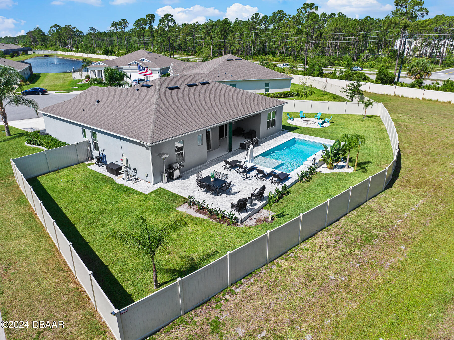 295 Cypress Trail Drive Ormond Beach, FL 32174 - Photo 49 of 67 an aerial view of a house with a garden