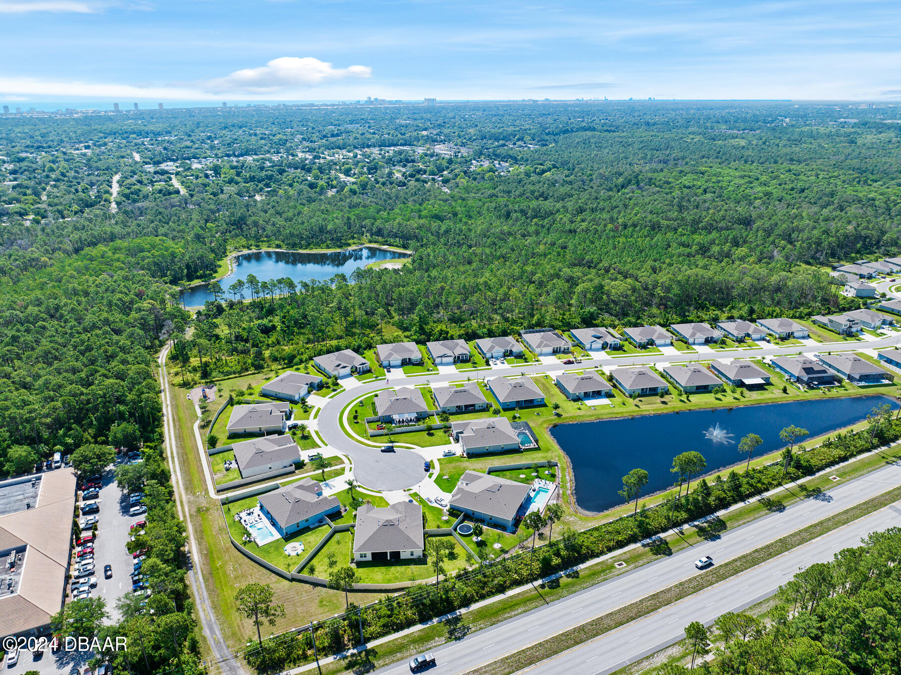 295 Cypress Trail Drive Ormond Beach, FL 32174 - Photo 58 of 67 an aerial view of house with yard swimming pool and outdoor seating