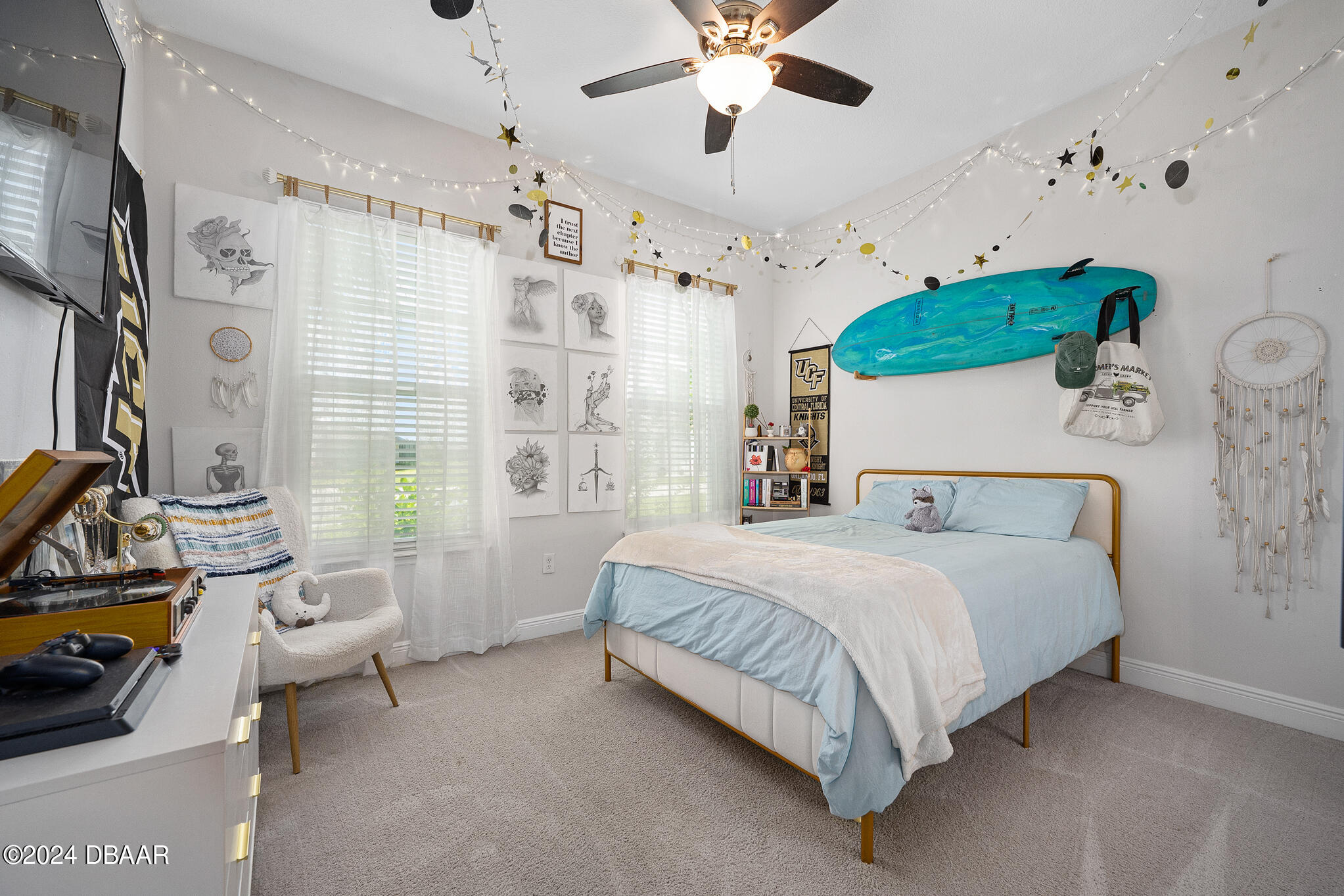 295 Cypress Trail Drive Ormond Beach, FL 32174 - Photo 6 of 67 a bed room with a bed and a chair