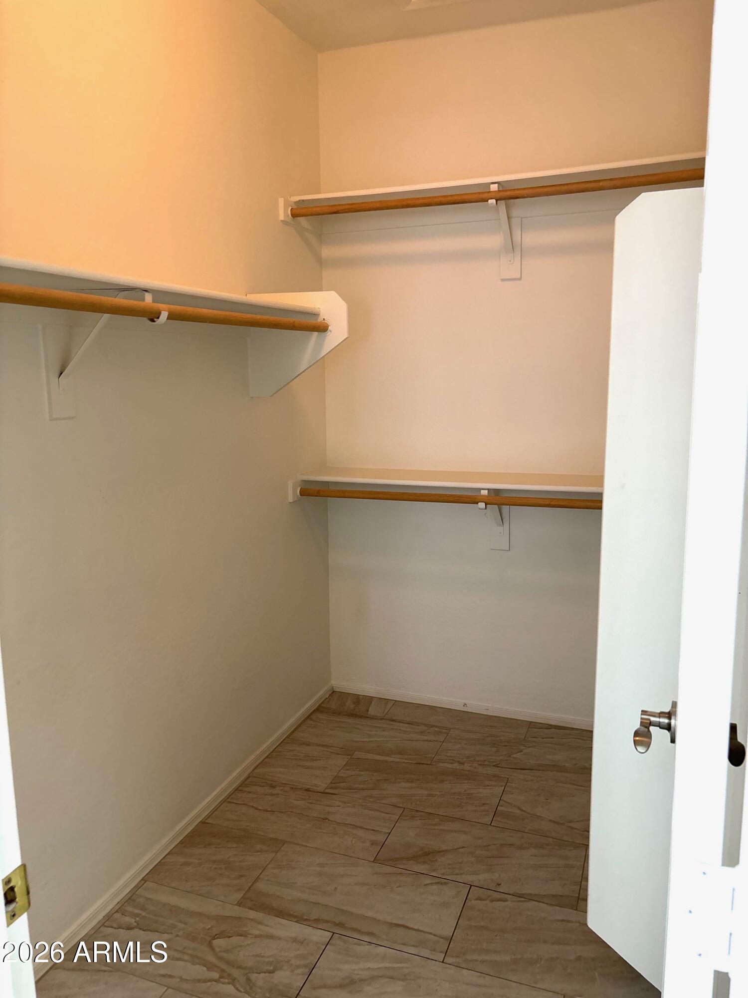525 North Miller Road, Unit 239 Scottsdale, AZ 85257 - Photo 24 of 52 a view of an empty walk in closet