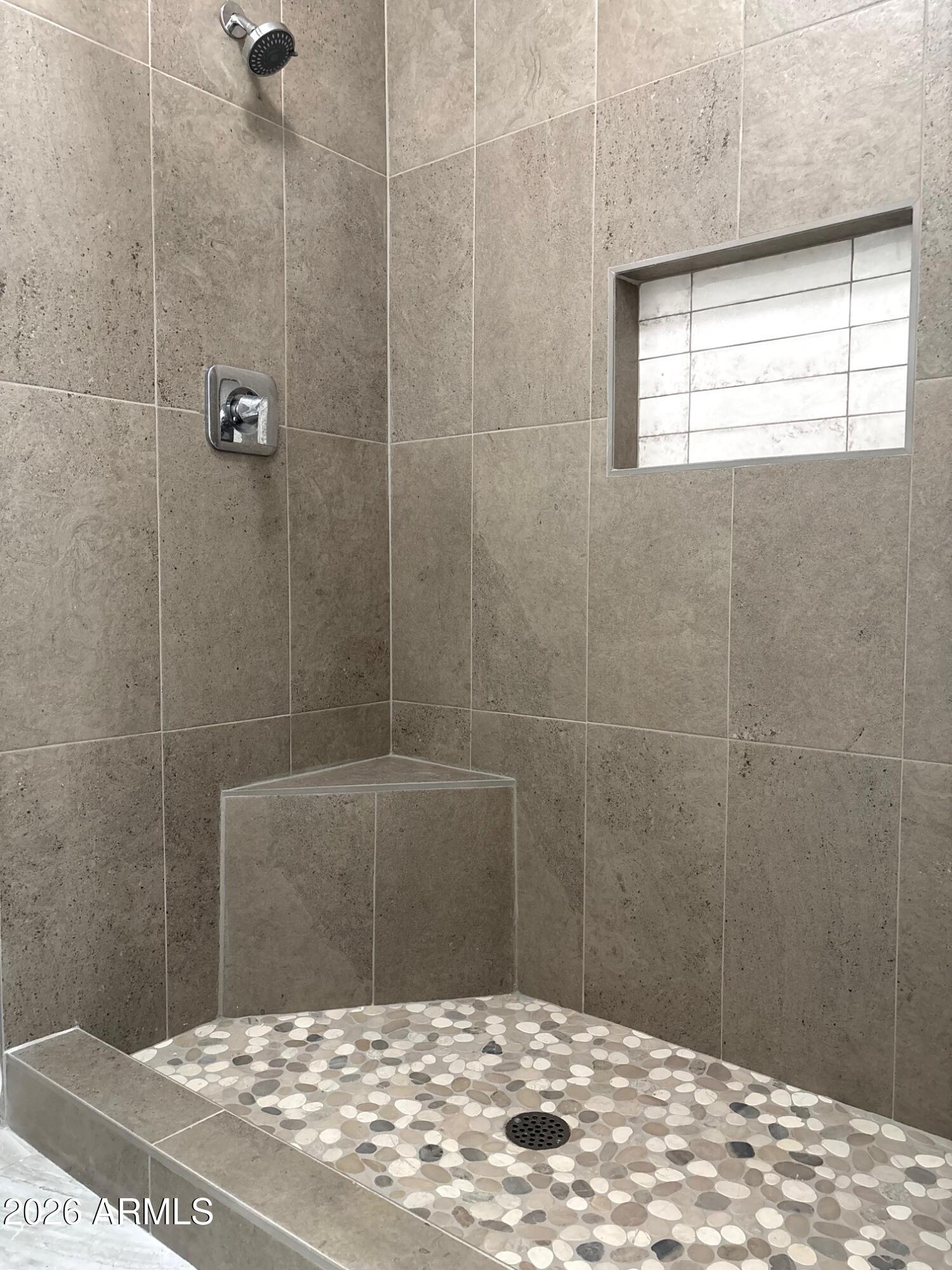 525 North Miller Road, Unit 239 Scottsdale, AZ 85257 - Photo 26 of 52 a bathroom with a window