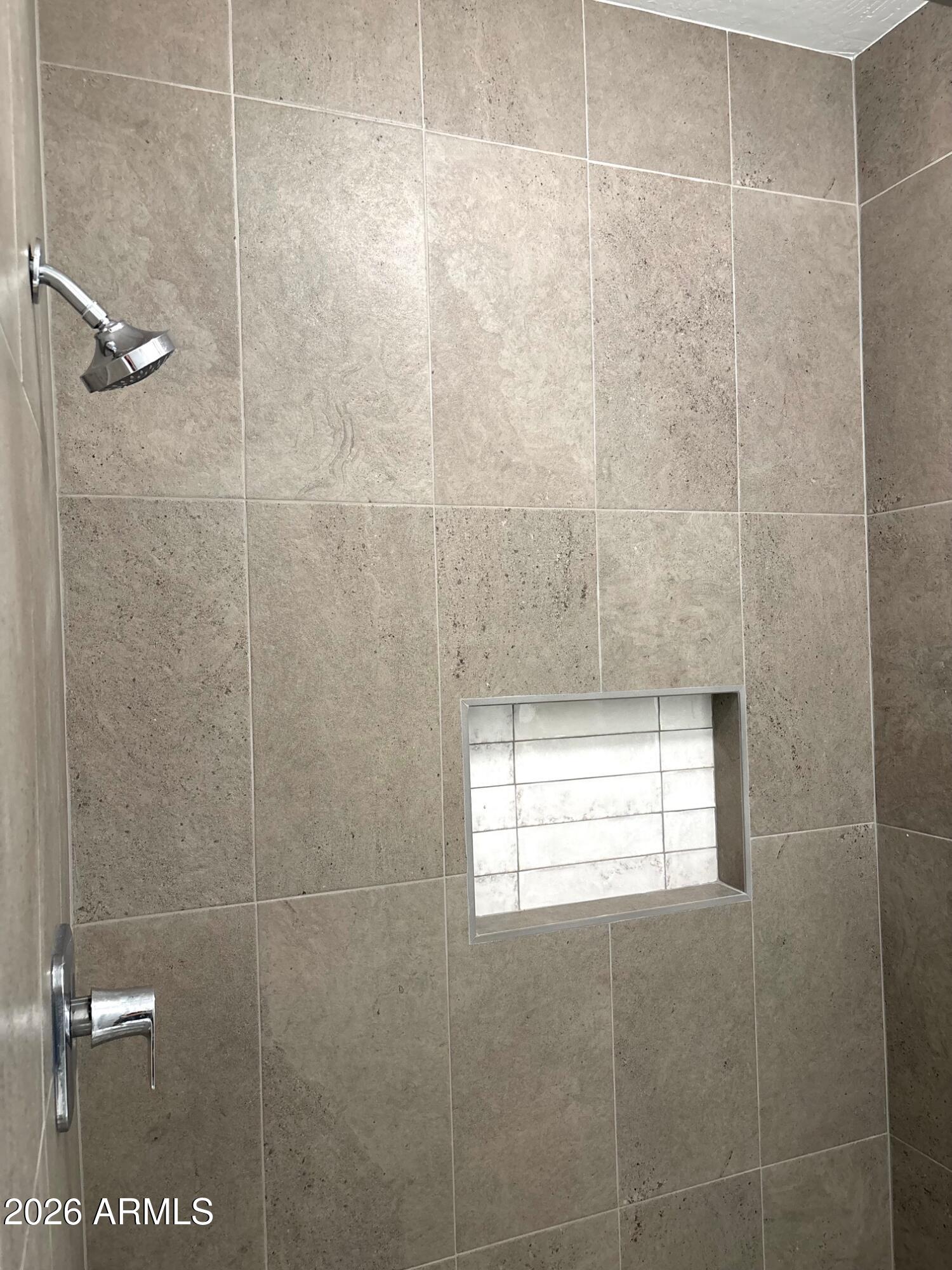 525 North Miller Road, Unit 239 Scottsdale, AZ 85257 - Photo 28 of 52 a bathroom with a window