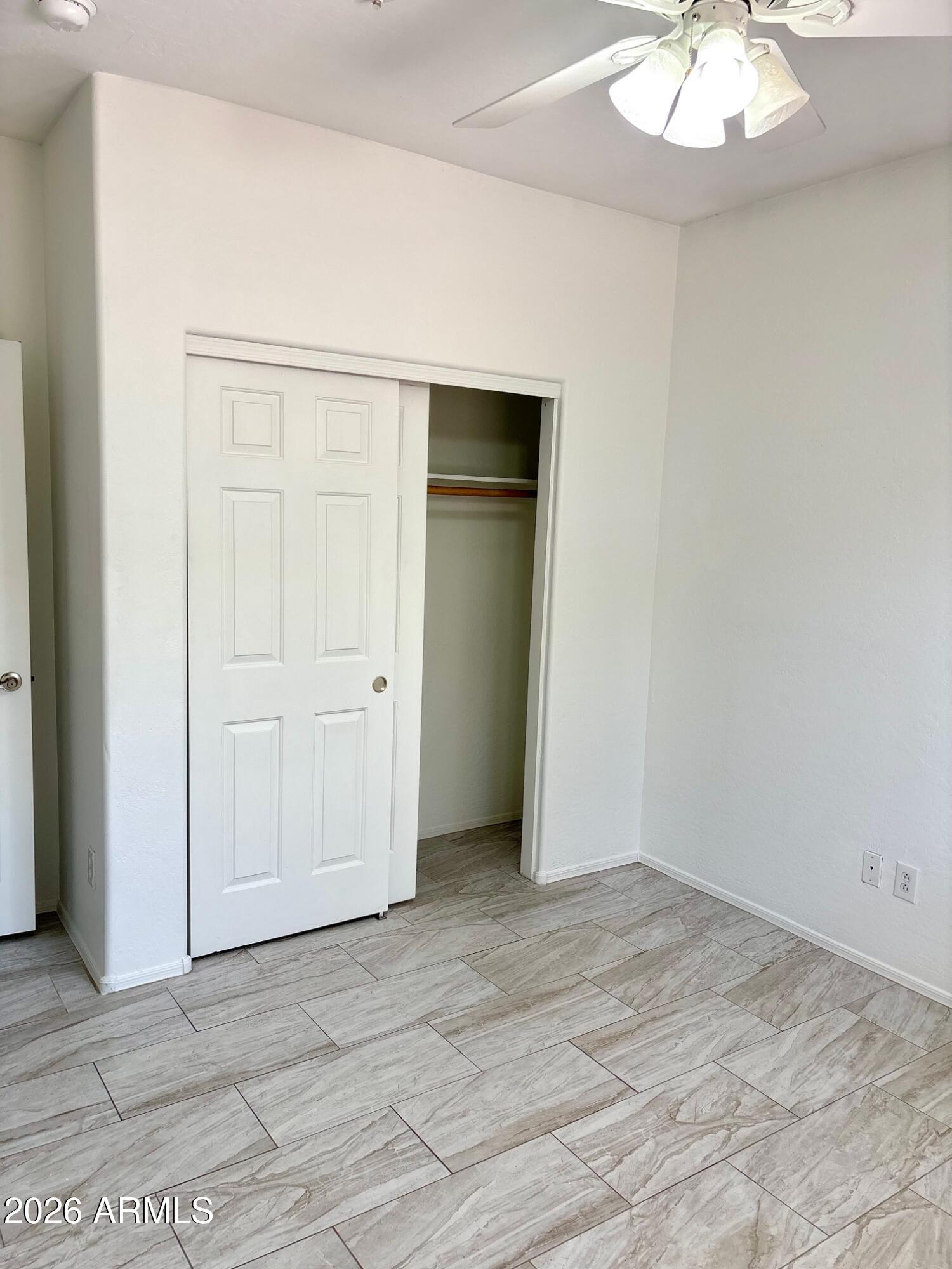 525 North Miller Road, Unit 239 Scottsdale, AZ 85257 - Photo 31 of 52 an empty room with a bathroom