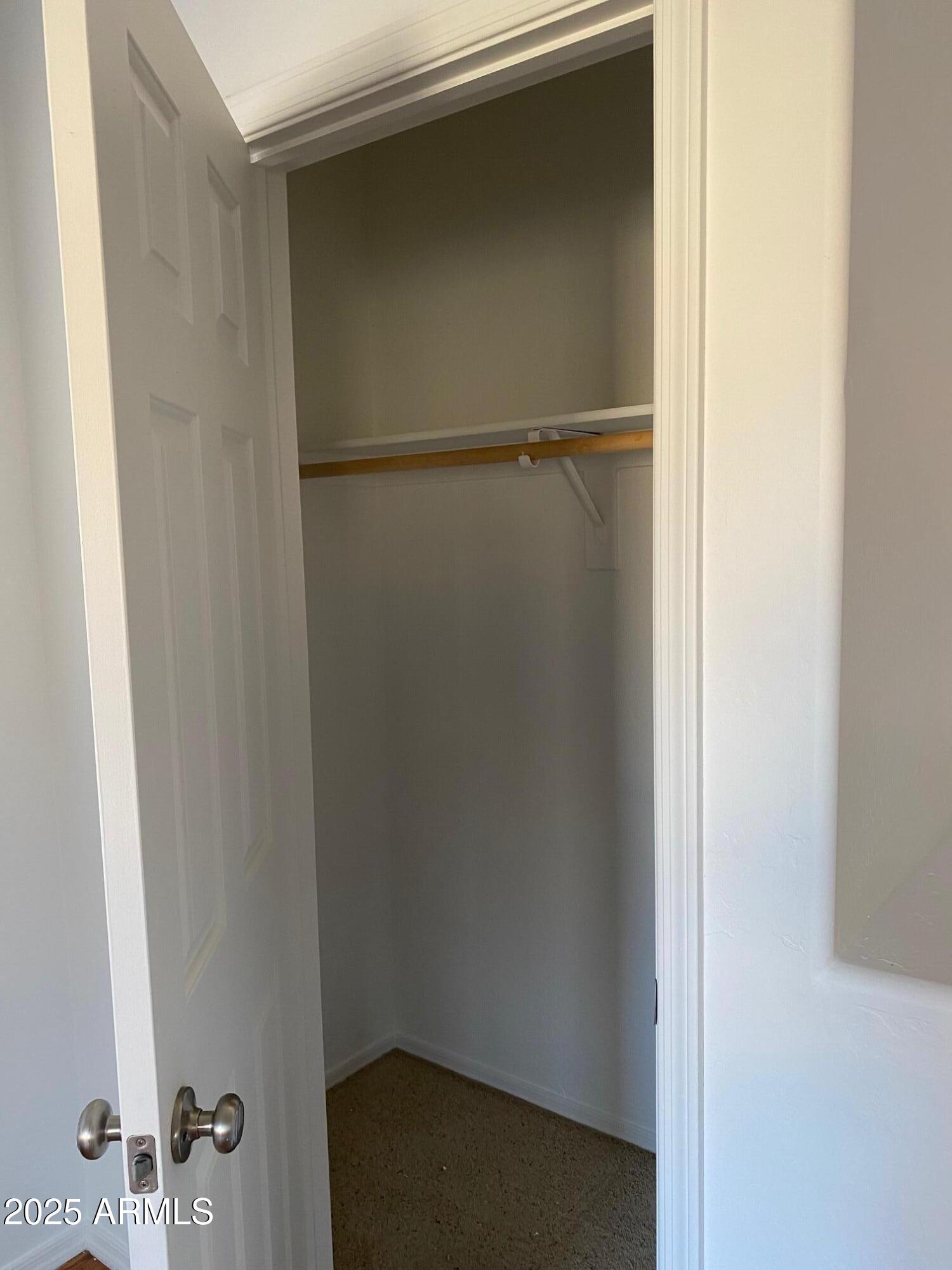 525 North Miller Road, Unit 239 Scottsdale, AZ 85257 - Photo 39 of 52 a view of an empty walk in closet