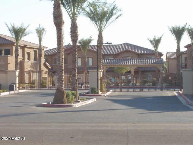 525 North Miller Road, Unit 239 Scottsdale, AZ 85257 - Photo 44 of 52 a view of a building and tree s