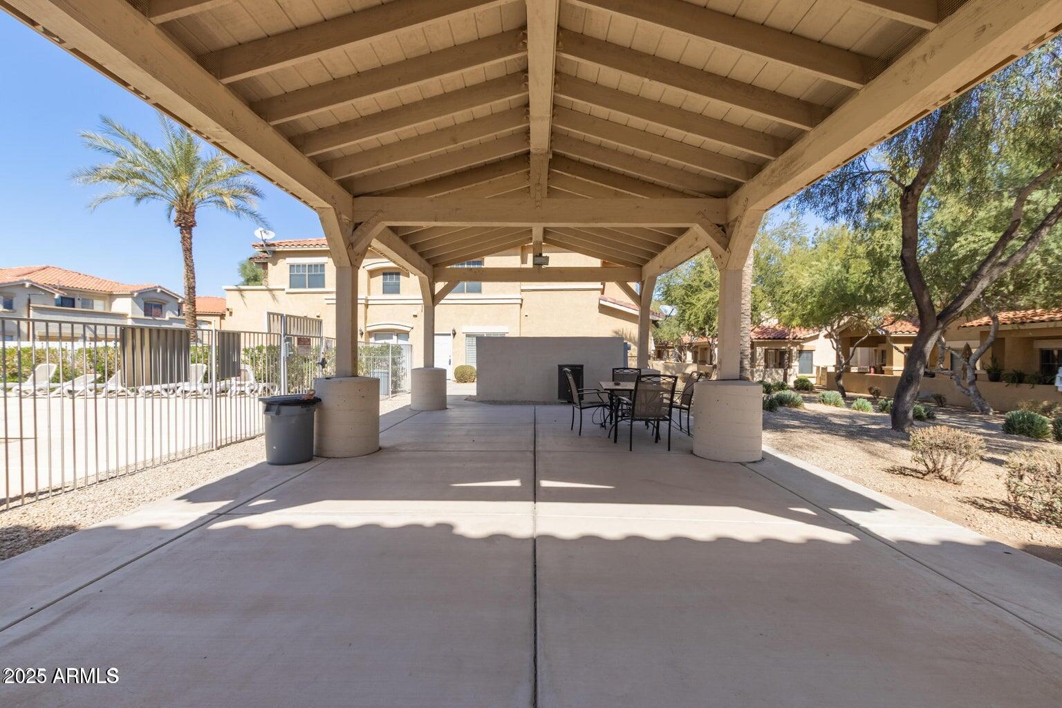 525 North Miller Road, Unit 239 Scottsdale, AZ 85257 - Photo 46 of 52 a view of a porch with furniture