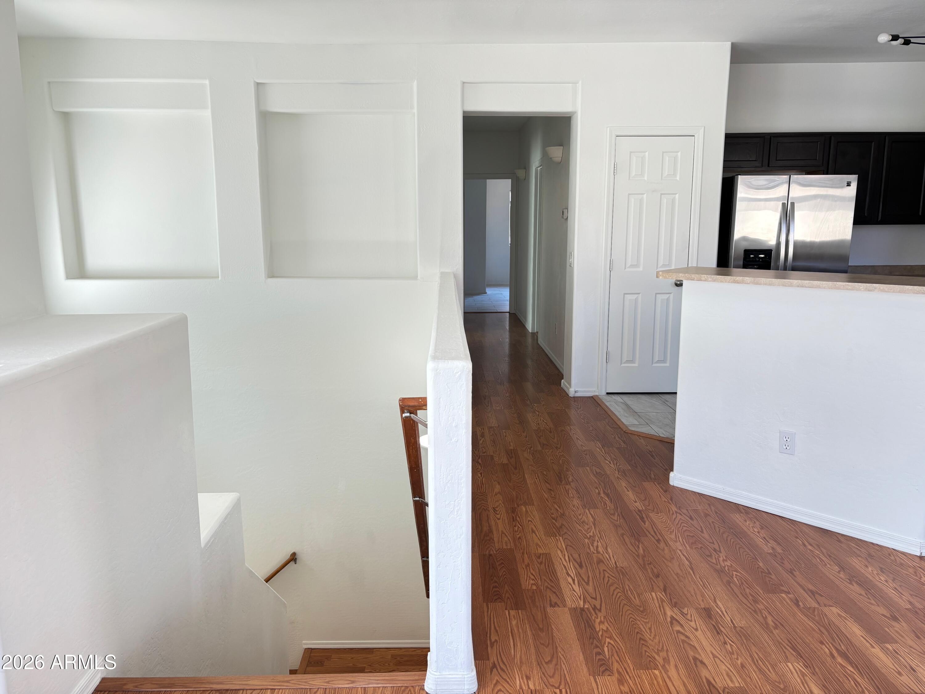 525 North Miller Road, Unit 239 Scottsdale, AZ 85257 - Photo 9 of 52 wooden floor in a kitchen