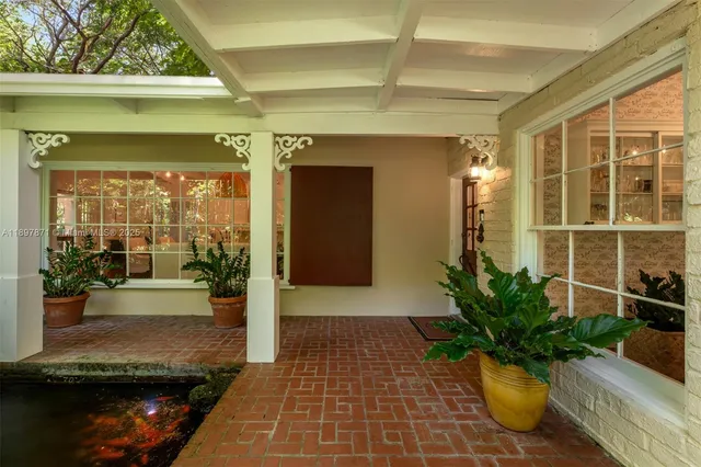 a view of a entryway door front of house