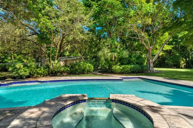 a view of backyard with seating space