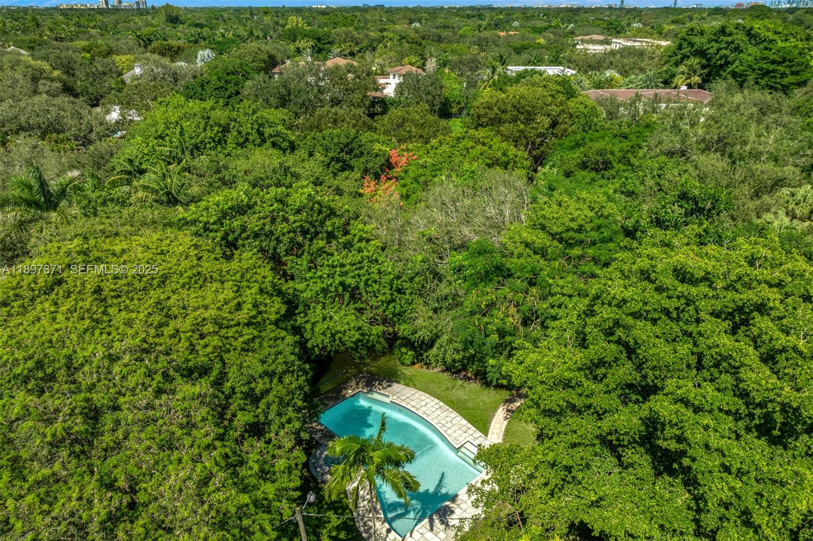 5950 Southwest 128th Street Pinecrest, FL 33156 - Photo 36 of 37 a view of a yard