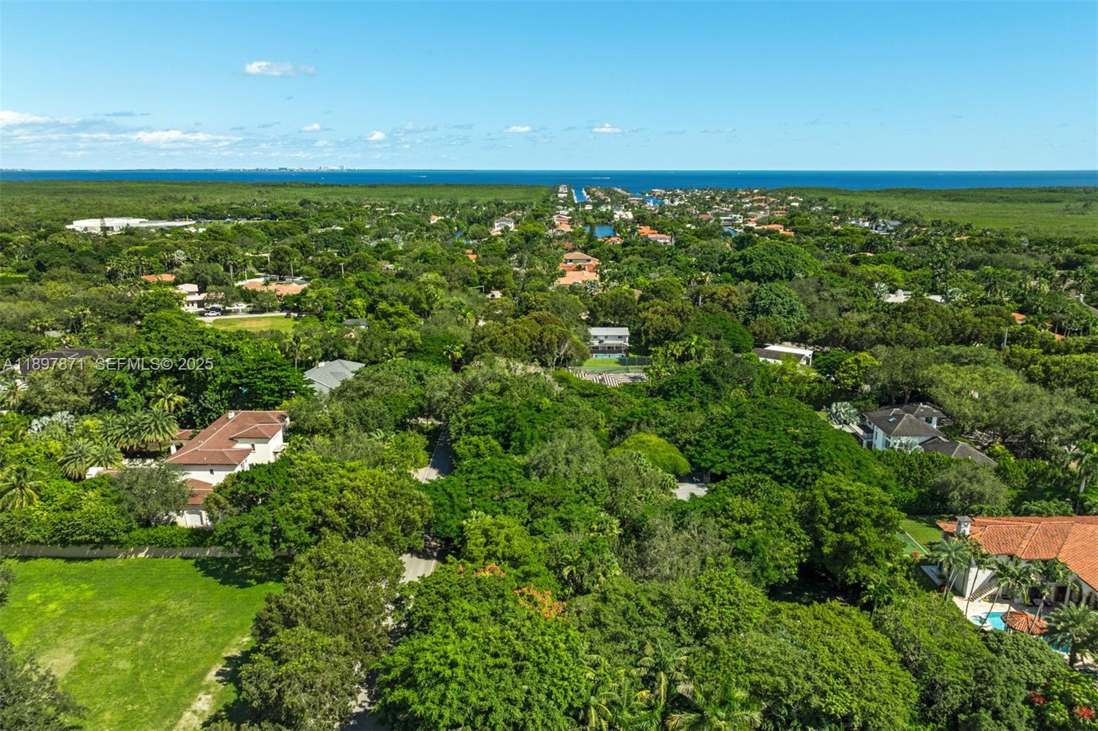 5950 Southwest 128th Street Pinecrest, FL 33156 - Photo 37 of 37 a view of a large yard