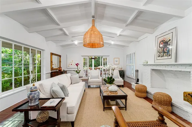 a kitchen with a sink and a large window