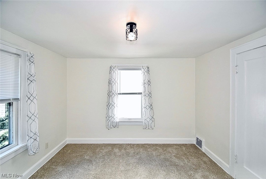1233 Ridge Road Northwest Canton, OH 44703 - Photo 13 of 24 bedroom featuring light carpet