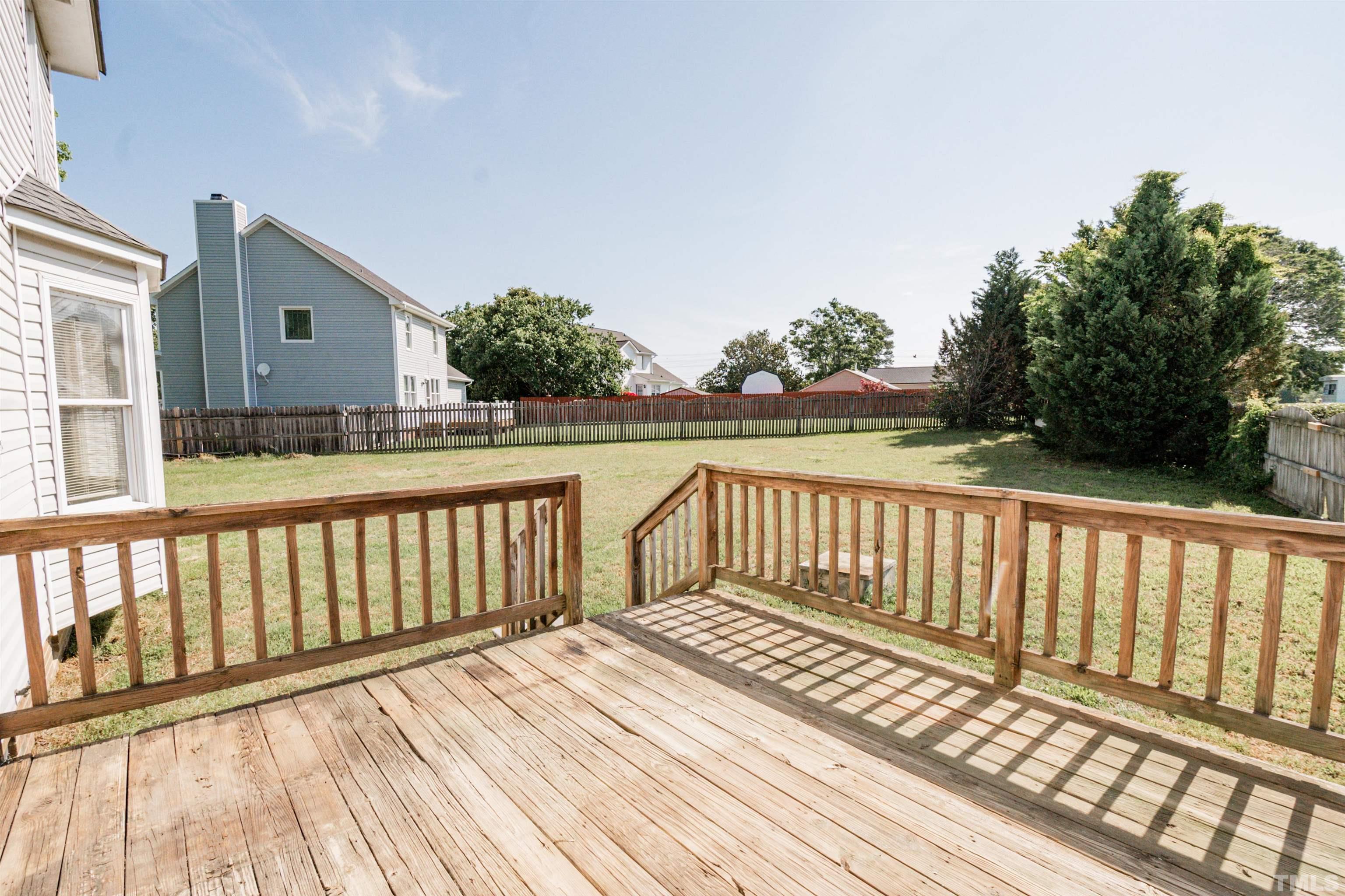 99 Windsor Drive Angier, NC 27501 - Photo 20 of 21 a balcony with wooden floor