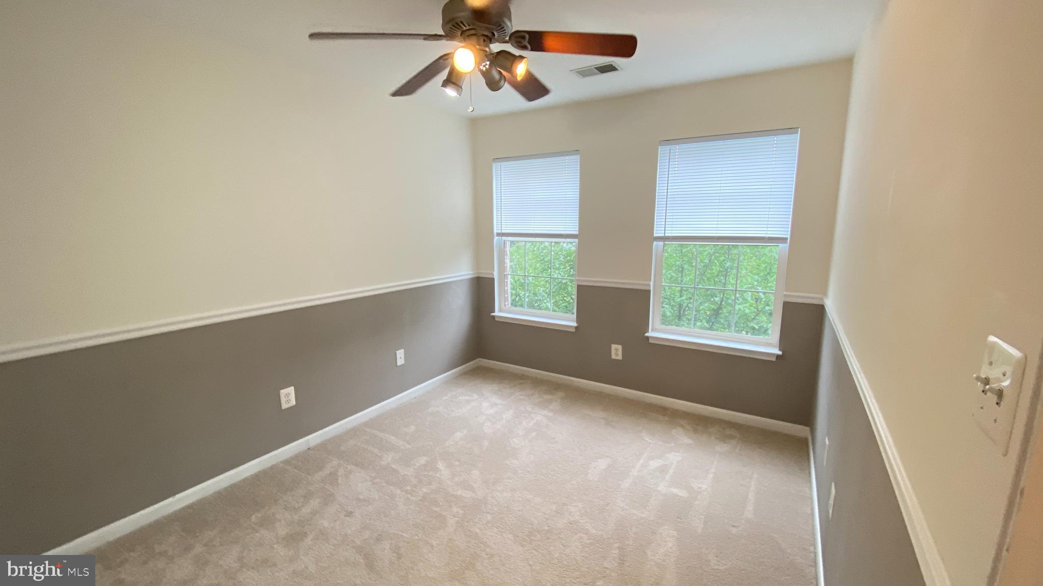 8231 Ramseur Place Manassas, VA 20109 - Photo 11 of 16 a view of an empty room with a window