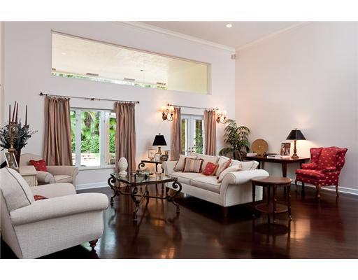 6329 Northwest 23rd Way Boca Raton, FL 33496 - Photo 2 of 10 a living room with furniture and a large window
