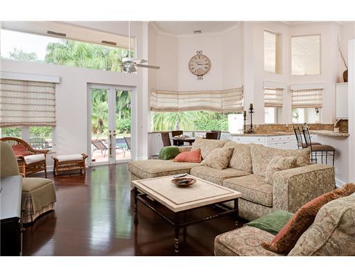 6329 Northwest 23rd Way Boca Raton, FL 33496 - Photo 5 of 10 a living room with furniture and large windows