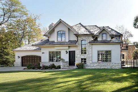 2141 Sunset Ridge Road Glenview, IL 60025 - Photo 1 of 1 a front view of a house with a yard