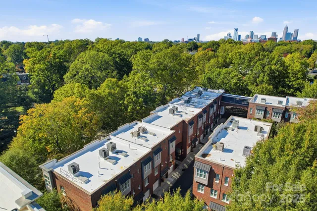 a view of a house with roof deck and outdoor space