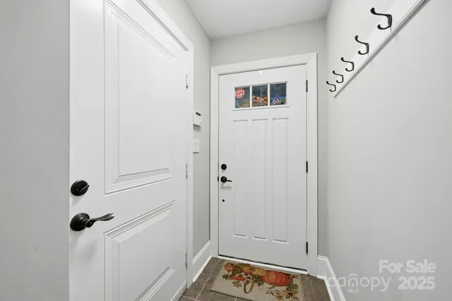 a view of a hallway with a door