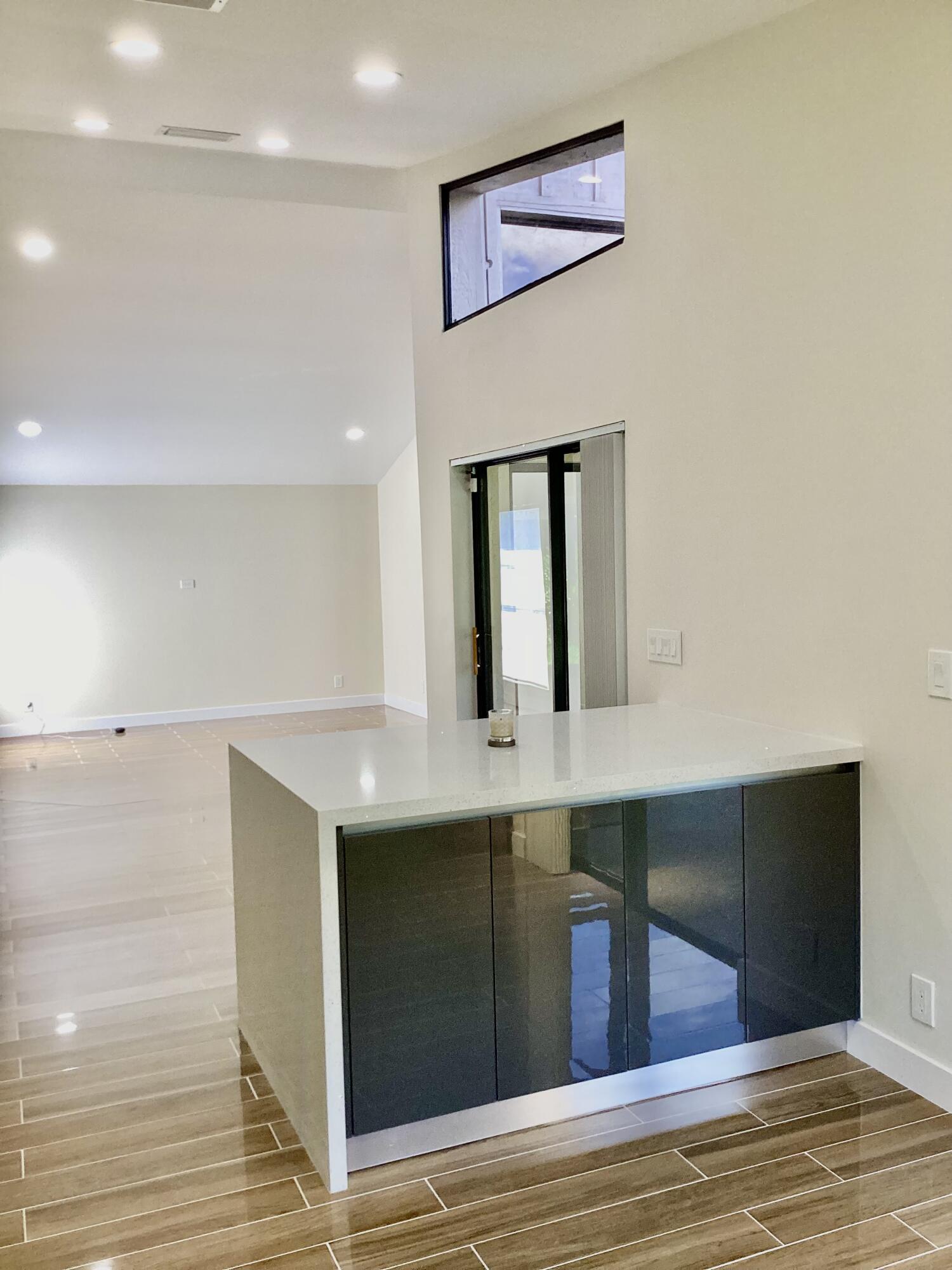 8895 Old Pine Road Boca Raton, FL 33433 - Photo 11 of 46 KITCHEN ISLAND