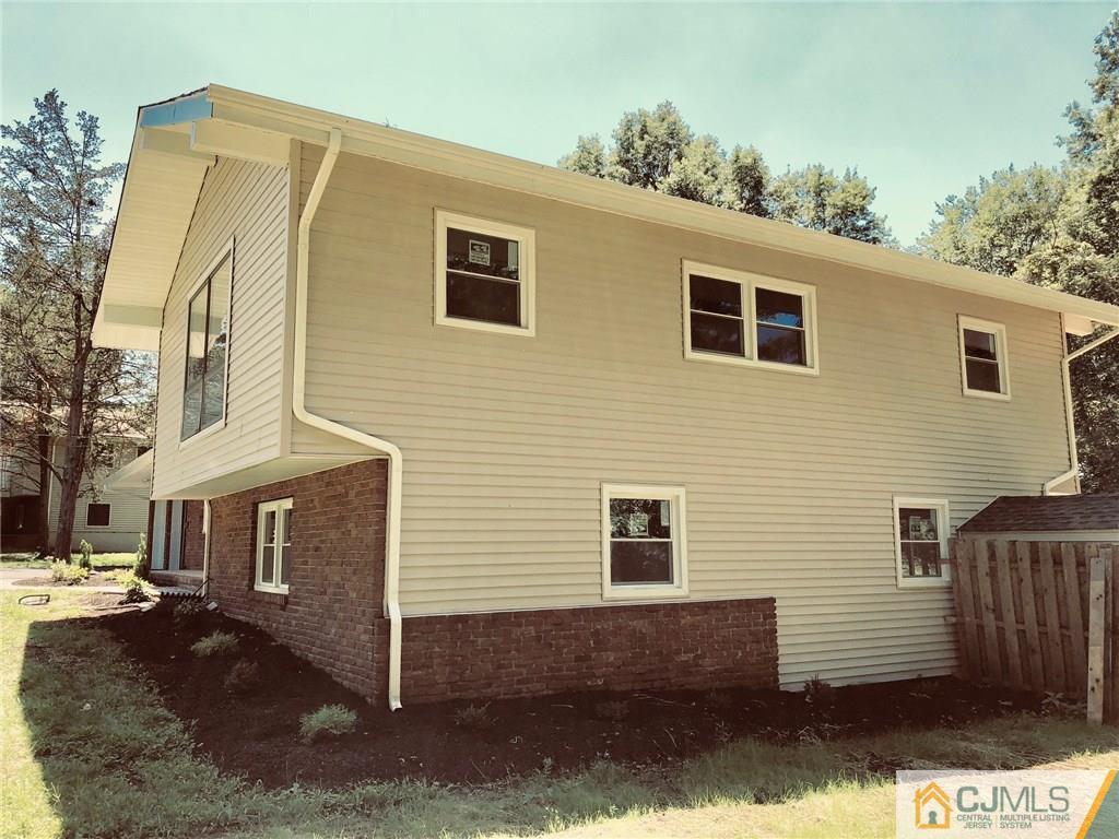 738 West Foothill Road Bridgewater, NJ 08807 - Photo 4 of 22 a view of a house with a yard