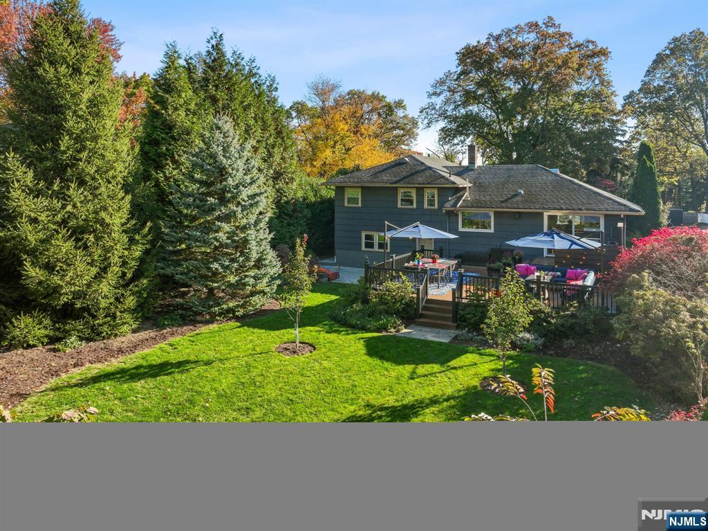 398 Grove Street Montclair, NJ 07043 - Photo 32 of 48 a front view of house with yard and green space