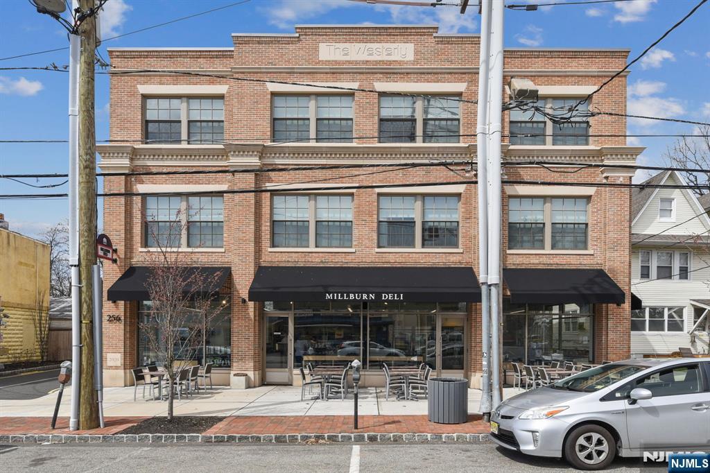 398 Grove Street Montclair, NJ 07043 - Photo 44 of 48 a front view of a building with street