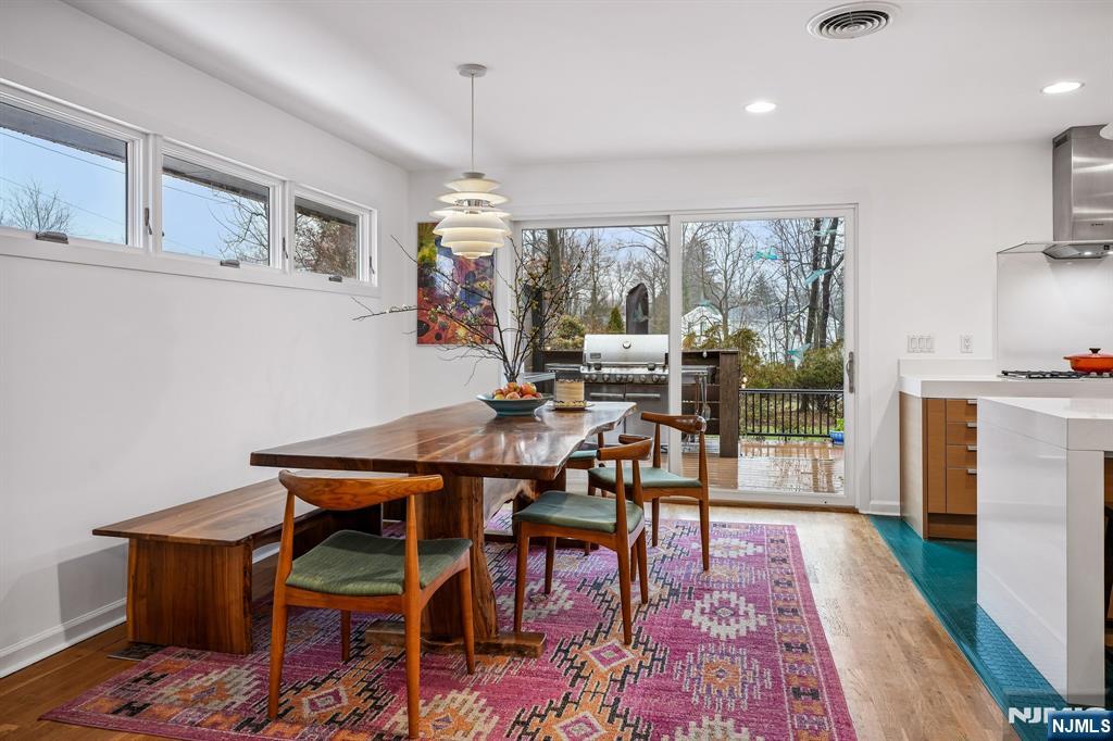 398 Grove Street Montclair, NJ 07043 - Photo 5 of 48 a view of a dining room with furniture window and wooden floor