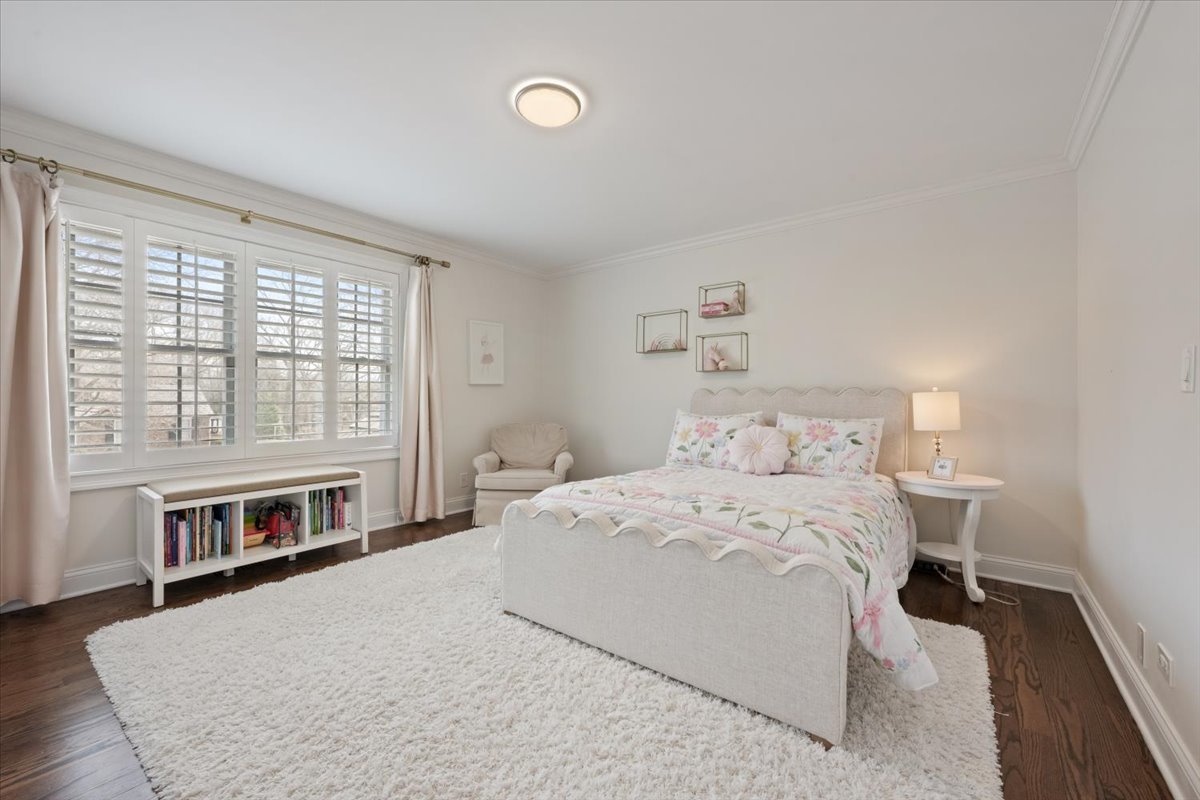 1588 White Oak Road Lake Forest, IL 60045 - Photo 16 of 35 a bedroom with a bed and a large window