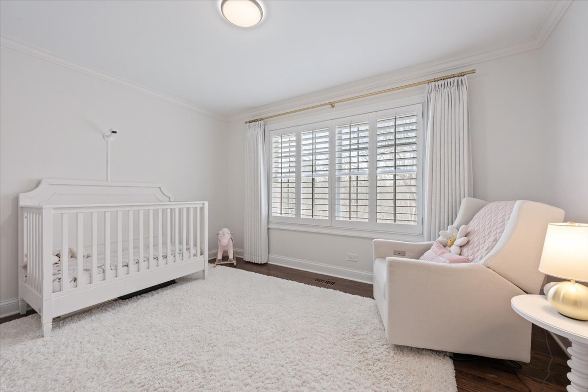 1588 White Oak Road Lake Forest, IL 60045 - Photo 17 of 35 a bed room with furniture and a window