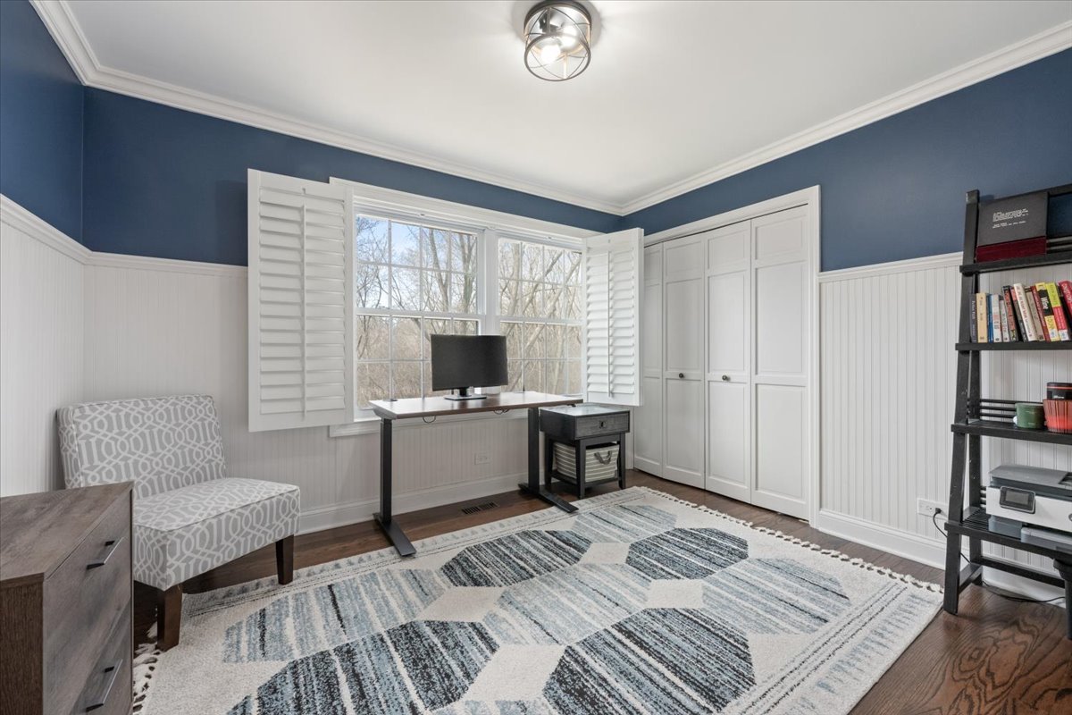 1588 White Oak Road Lake Forest, IL 60045 - Photo 18 of 35 a bedroom with furniture and a book shelf