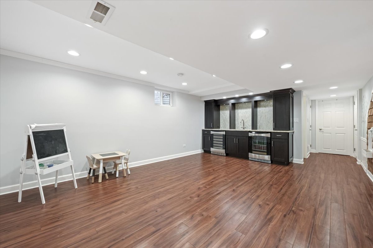 1588 White Oak Road Lake Forest, IL 60045 - Photo 22 of 35 a view of kitchen with wooden floor and chairs