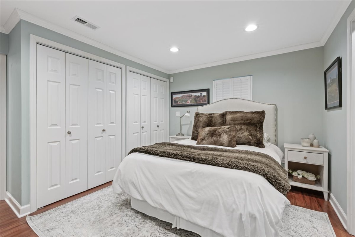 1588 White Oak Road Lake Forest, IL 60045 - Photo 26 of 35 a bedroom with a bed and a view of kitchen