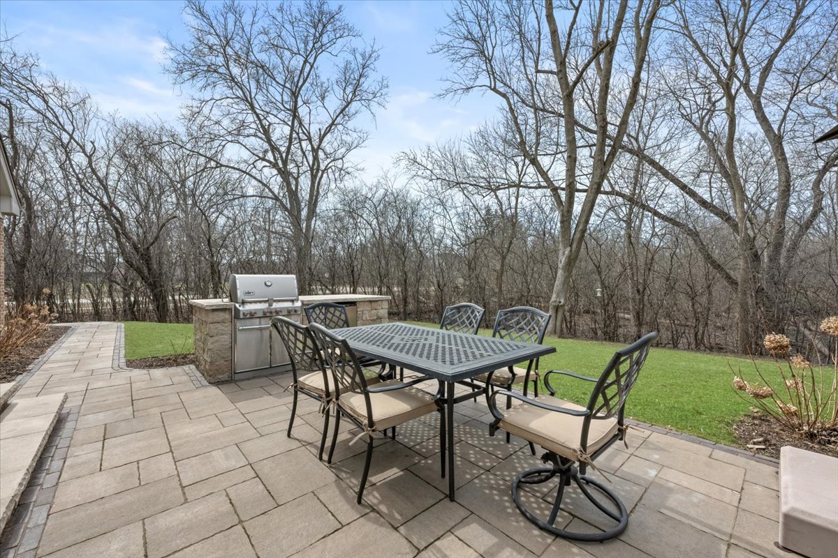 1588 White Oak Road Lake Forest, IL 60045 - Photo 29 of 35 a view of a backyard with sitting area
