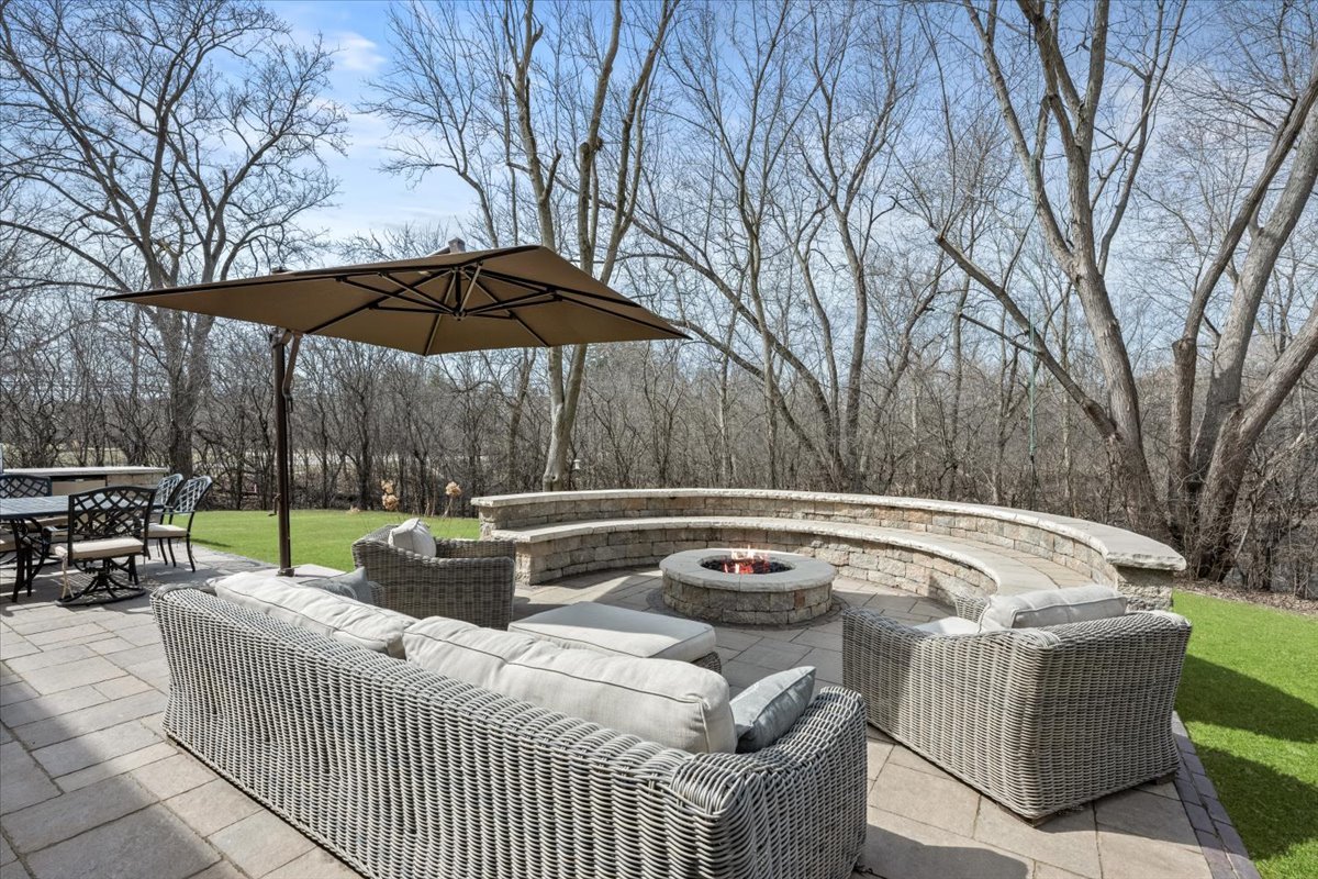 1588 White Oak Road Lake Forest, IL 60045 - Photo 30 of 35 a view of backyard with seating space and trees