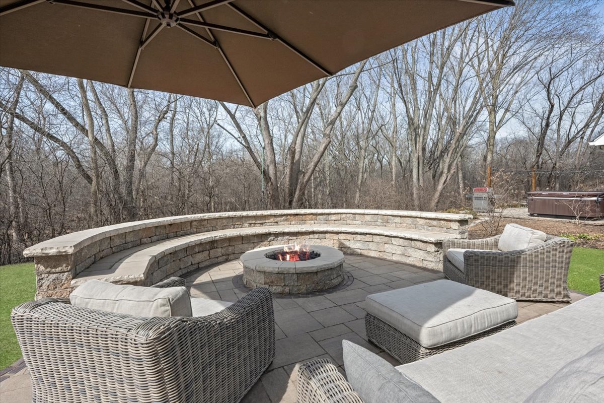 1588 White Oak Road Lake Forest, IL 60045 - Photo 31 of 35 a view of a swimming pool with a patio