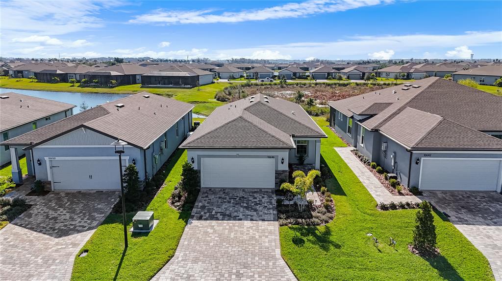10646 Spring Tide Way Palmetto, FL 34221 - Photo 1 of 1 an aerial view of a house with a swimming pool