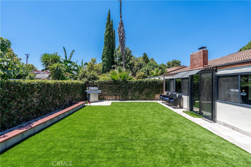 11520 Los Molinos Way Riverside, CA 92505 - Photo 2 of 26 a front view of a house with garden