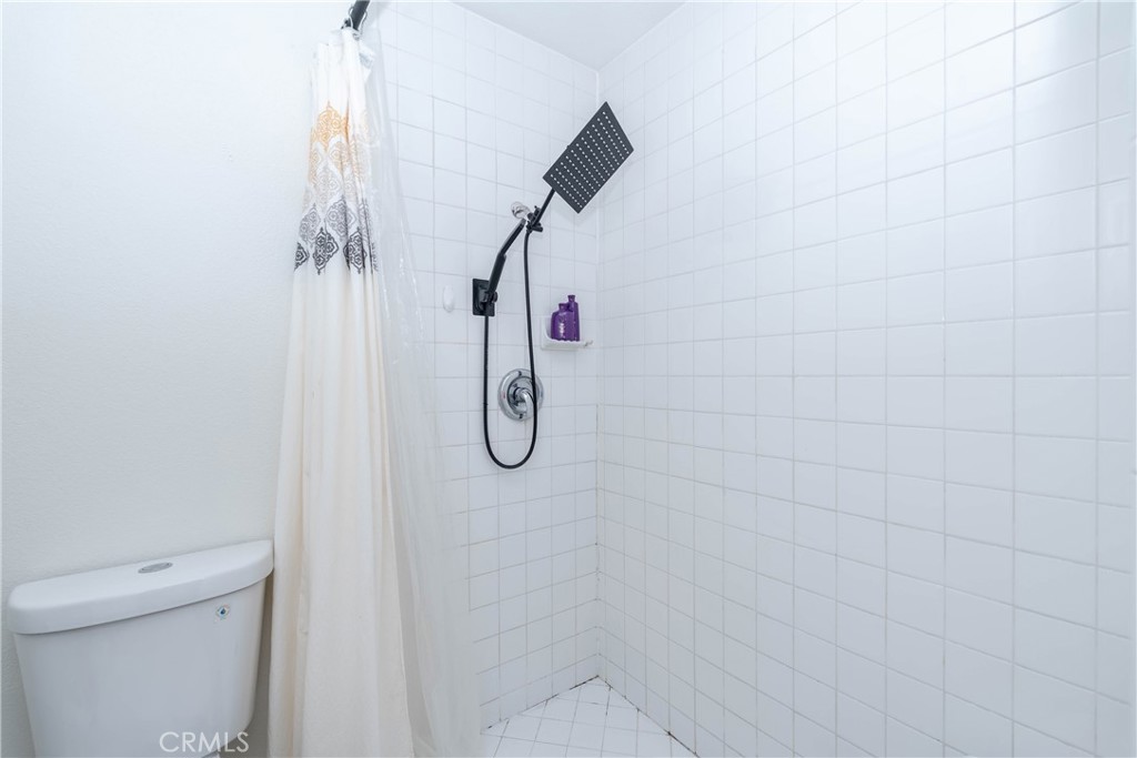 11520 Los Molinos Way Riverside, CA 92505 - Photo 22 of 26 a bathroom with a shower