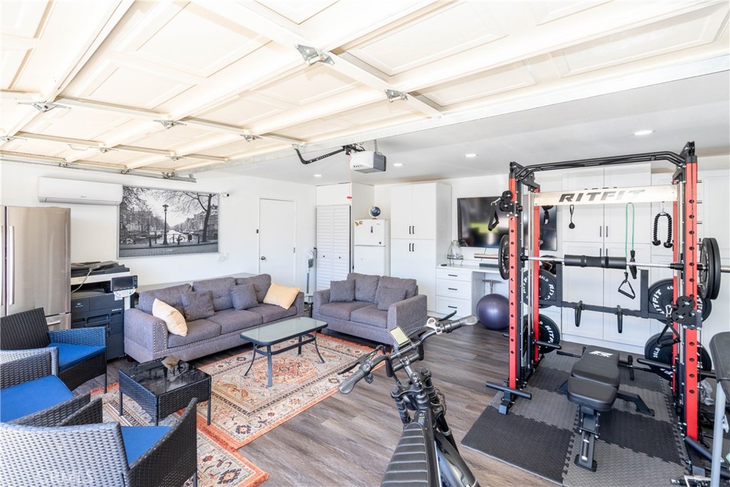 11520 Los Molinos Way Riverside, CA 92505 - Photo 23 of 26 a living room with lots of furniture and white walls