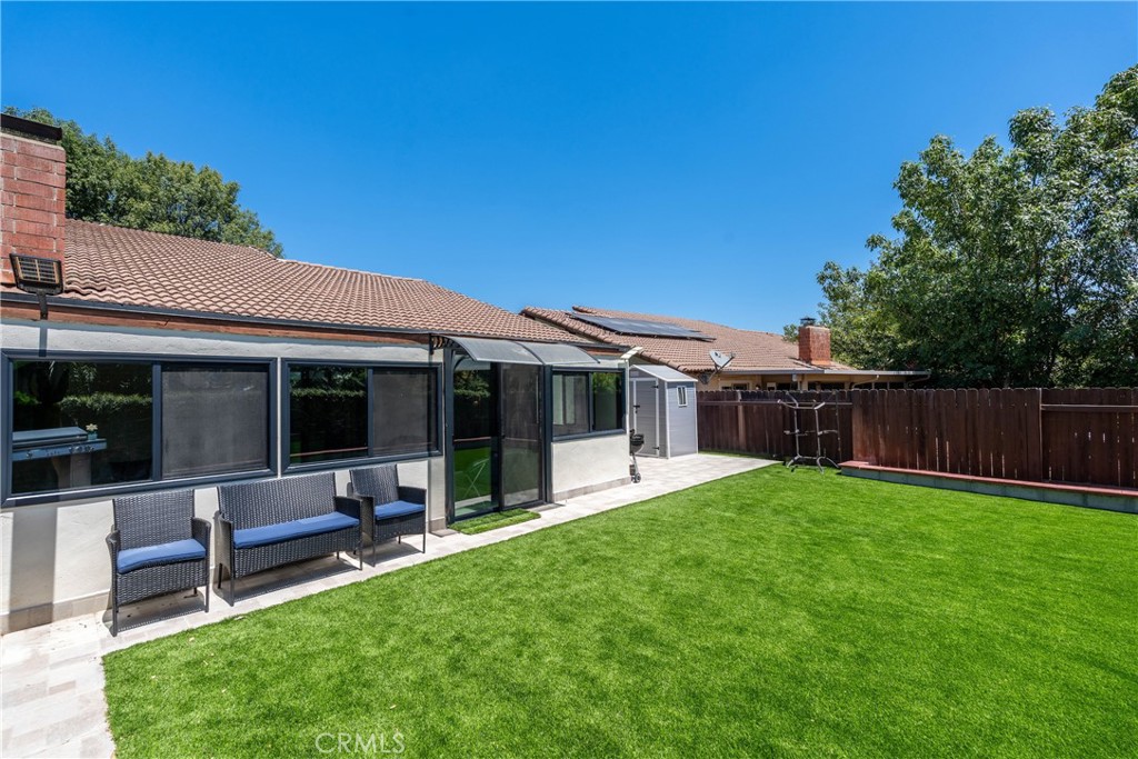 11520 Los Molinos Way Riverside, CA 92505 - Photo 25 of 26 a view of a house with a yard and sitting area