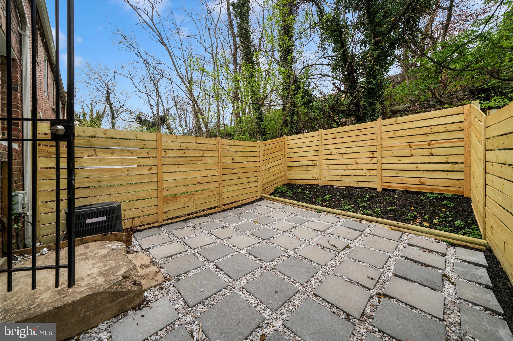 5045 Sheriff Road Northeast Washington, DC 20019 - Photo 22 of 38 a view of a backyard of the house