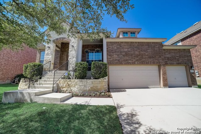 3223 Shoshoni Rise San Antonio, TX 78261 - Photo 1 of 1 a front view of a house with a yard